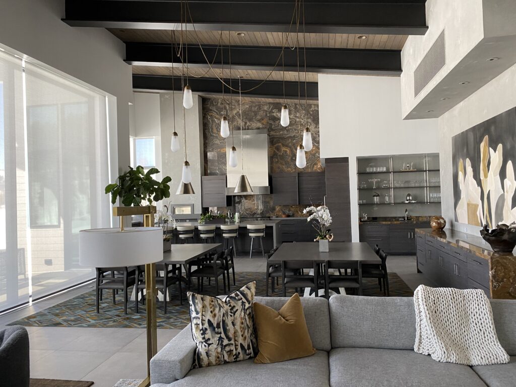 A Living Room With a Couch and Dining Table